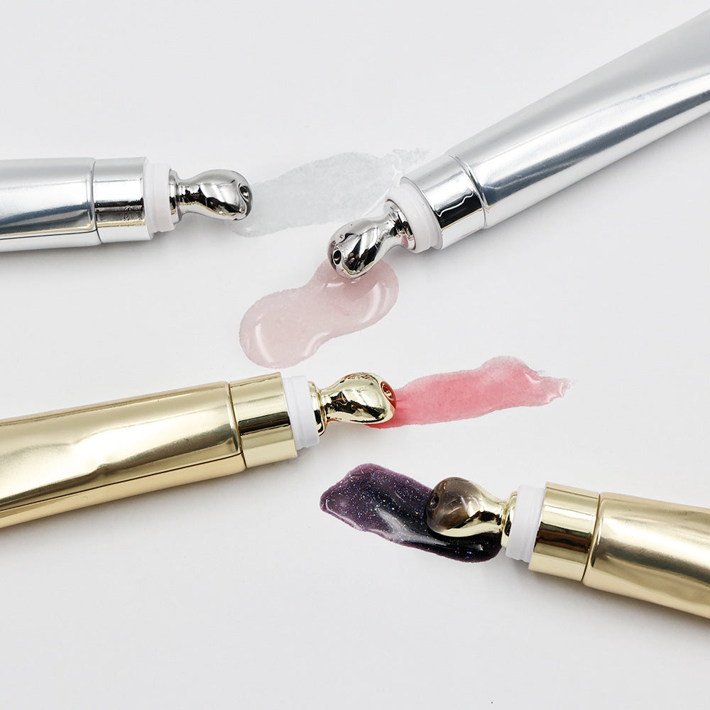 Extrusion tube massage head lip plumping oil